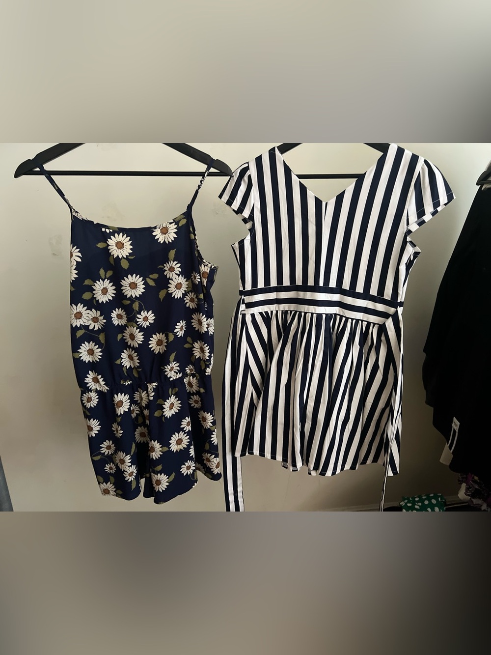 sunflower print romper and a black-and-white striped dress.L
